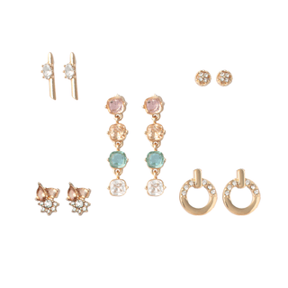 Five-piece gold earring set with pastel gemstone drops, crystal-accented gold hoops, butterfly studs, minimalist bar drops, and pavé studs, packaged in a gift box.