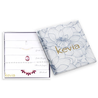 Silver boxed necklace set with pink and crystal accents in layered chain styles