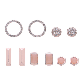 Five-pair rose gold earring set featuring pavé crystal studs, geometric accents, polished hoops, hexagon shapes, and minimalist bars, packaged in a gift box.