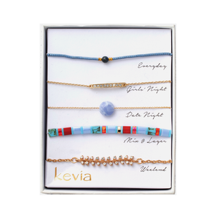 Five-piece turquoise and lapis beaded bracelet set with pavé accents and mosaic beads, packaged in a gift box.