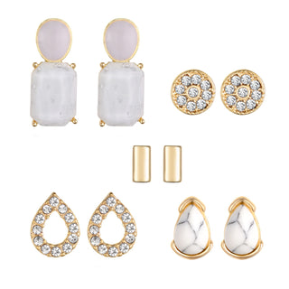 Five-pair earring set with drop earrings, textured studs, polished bar accents, crystal teardrops, and marbled stone teardrop earrings.