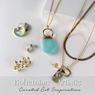 Bohemian and Artistic five-piece mystery jewelry set featuring a large turquoise stone pendant, abalone half-moon earrings, floral studs, aqua crystal posts, and a gold charm necklace. Packaged as a curated set inspiration.