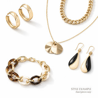 Style example image for The Bold + Beautiful Curated Jewelry Bundle featuring gold hoop earrings, layered gold necklaces, black and gold drop earrings, and a chunky tortoise and cream link bracelet.