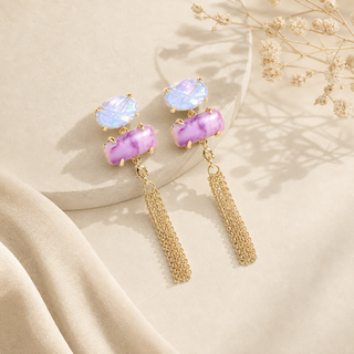 Gold chain tassel drop earrings with blue oval and pink rectangular opals.