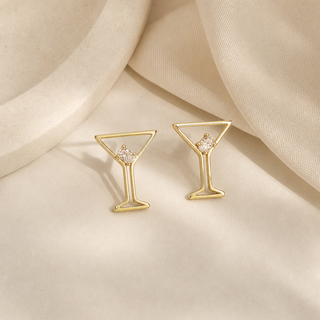 Gold open martini glass stud earrings with small crystal accents.