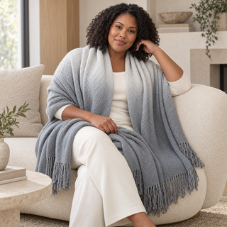 Gray Ombré Cable Knit Blanket Scarf — 4. model on a large chair